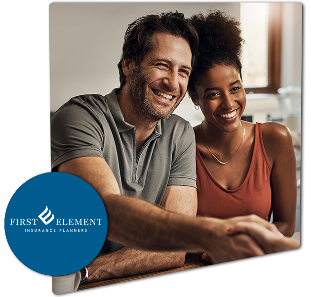 a smiling couple shaking hands with their insurance advisor